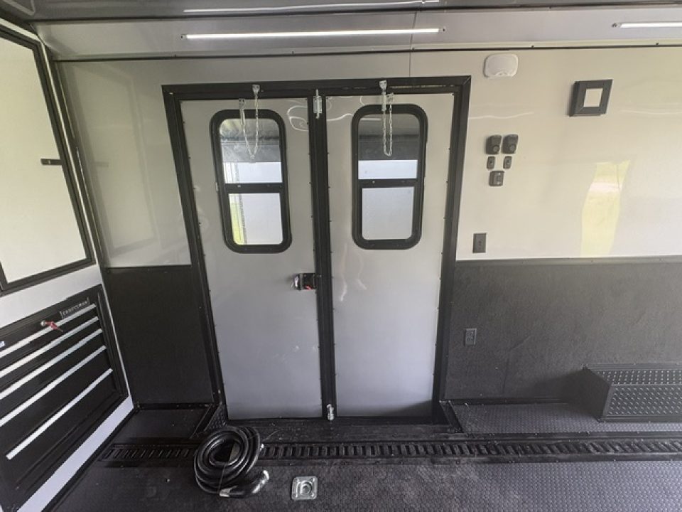 New 2027 Rock Solid Cargo Super Sport Enclosed Race Trailer For Sale Rear Spoiler Spread Axle Awning Finished Interior Cabinets A/C