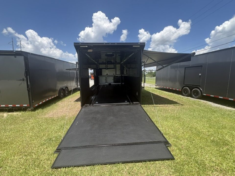 New 2027 Rock Solid Cargo Super Sport Enclosed Race Trailer For Sale Rear Spoiler Spread Axle Awning Finished Interior Cabinets A/C