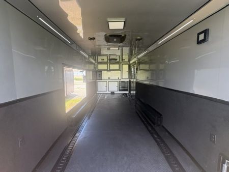 New 2027 Rock Solid Cargo Super Sport Enclosed Race Trailer For Sale Rear Spoiler Spread Axle Awning Finished Interior Cabinets A/C