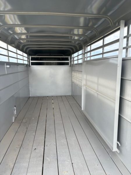 New 2026 Calico 6x16 Tandem 7K GN Stock Trailer W/ 1 Cut Gate