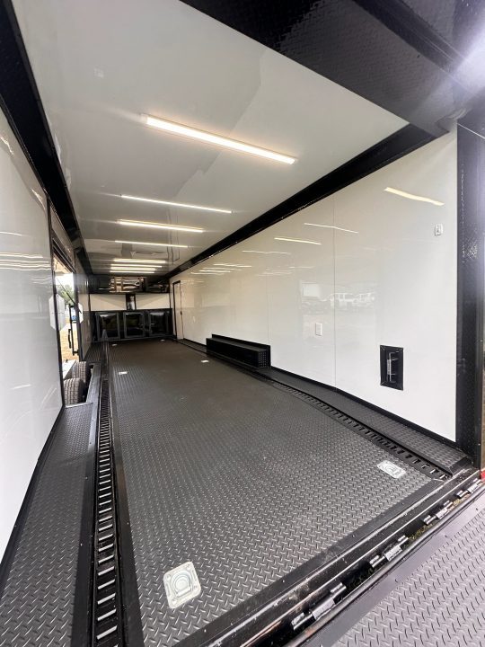 New 2027 8.5x28 Race Trailer - Finished Interior- 7000lb Spread Torsion - Recessed E-Track-Full Escape Door-Removable Fender