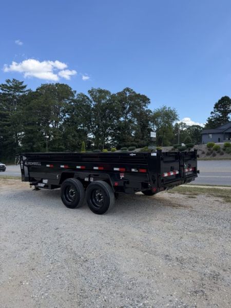 New 2027 Iron Bull Dump Trailer / DTB Series / 83" Wide x 16' Long / Scissor Hoist / Aluminum Ramps / Tarp / 24" High Sides / 2- 8,000# Electric Brake Axles / 17.5" Tires & Wheels / Matching Spare Tire & Wheel / HYD Jack / Fork Holders