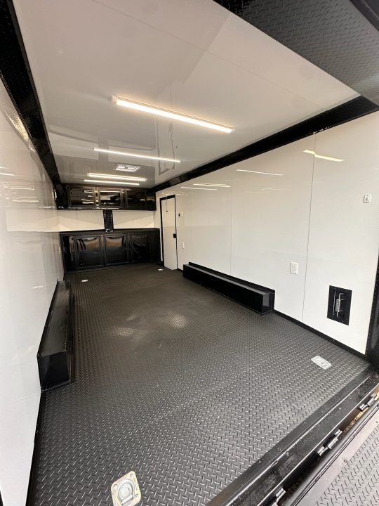 New 2027 8.5X18 Race Trailer - Finished Interior-5200LB Torsion Axle-Black Poly-Blackout