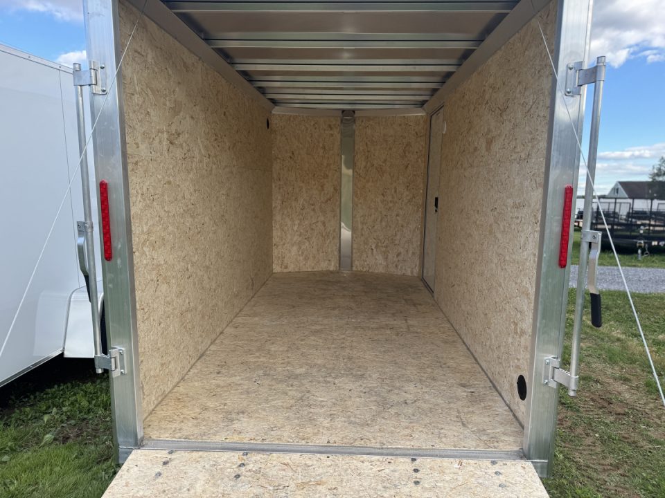 New 2027 E-Z Hauler EZEC6X12SA XLT PRO Cargo / Enclosed Trailer 6 FOOT 4 INCH INTERIOR HEIGHT, FREE ALUMINUM WHEEL UPGRADE