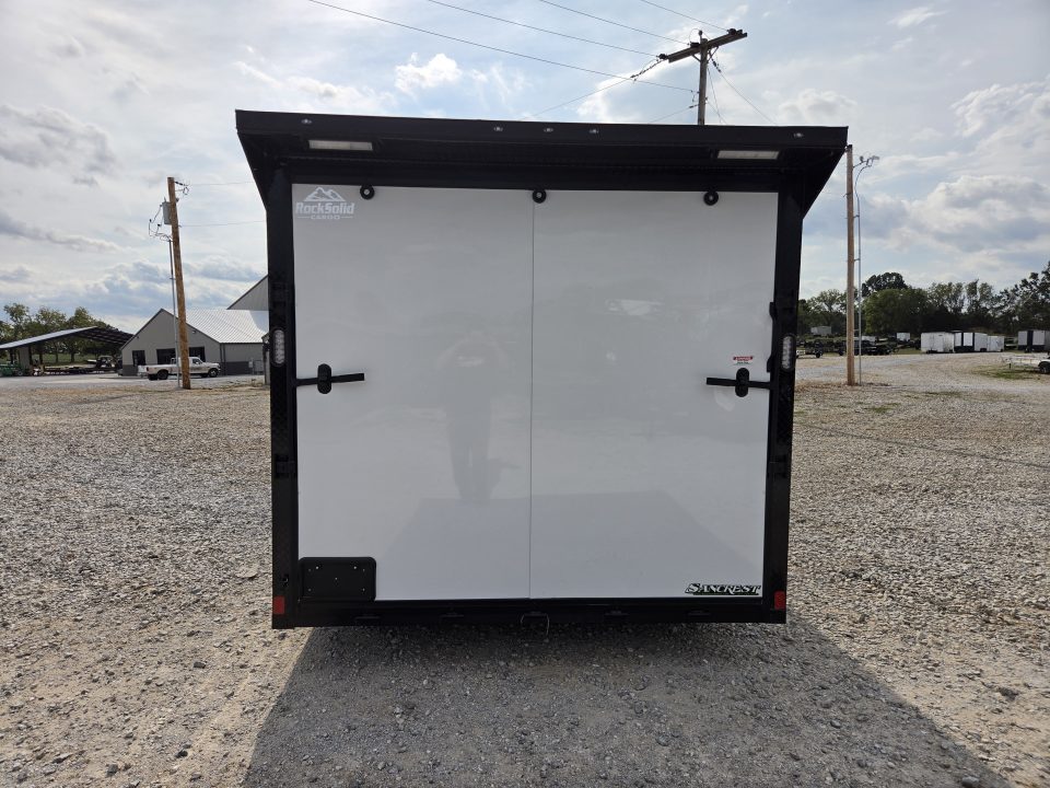 New 2027 Rock Solid 8.5X24 TANDEM 10K CARGO W/SPREAD AXLE DRIVERS SIDE ESCAPE OVER FENDER 7' HEIGHT BLACKOUT TRIM RUBBER NICKEL FLOORING
