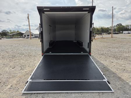 New 2027 Rock Solid 8.5X24 TANDEM 10K CARGO W/SPREAD AXLE DRIVERS SIDE ESCAPE OVER FENDER 7' HEIGHT BLACKOUT TRIM RUBBER NICKEL FLOORING