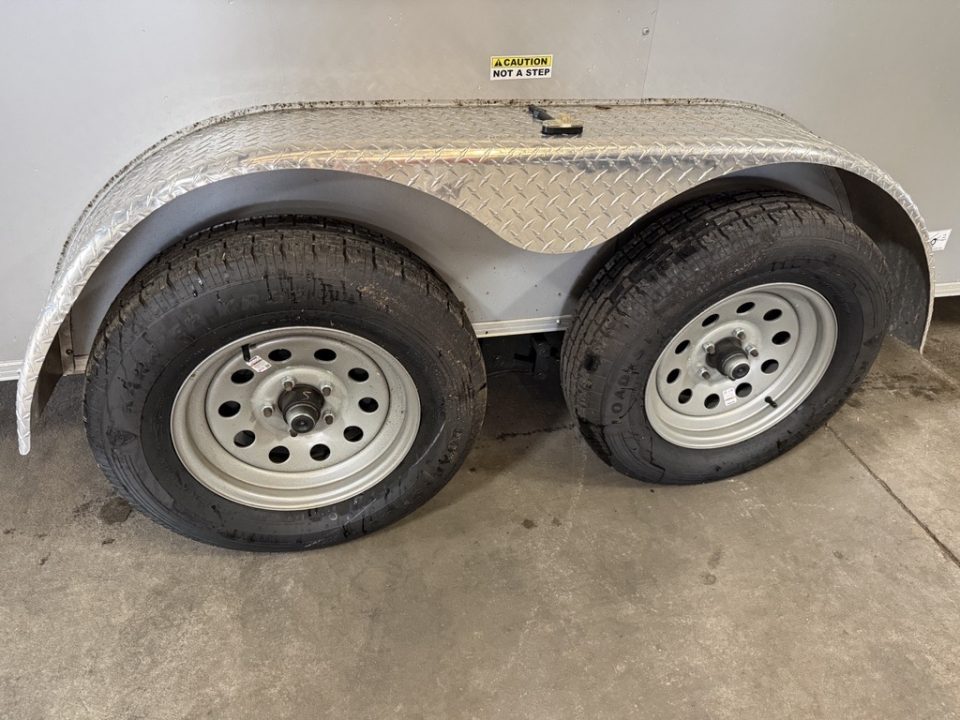 Used 2025 Cynergy Cargo 7X12 Silver Enclosed Cargo Trailer Tandem Axle with 7000 Capacity Cargo / Enclosed Trailer