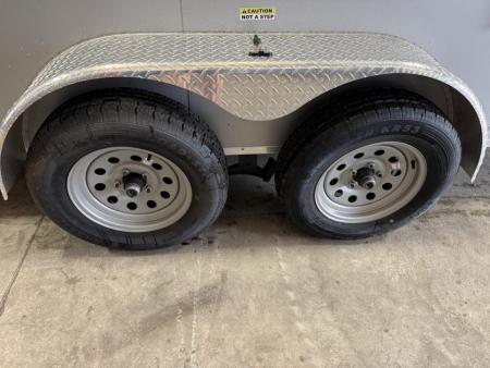 Used 2025 Cynergy Cargo 7X12 Silver Enclosed Cargo Trailer Tandem Axle with 7000 Capacity Cargo / Enclosed Trailer