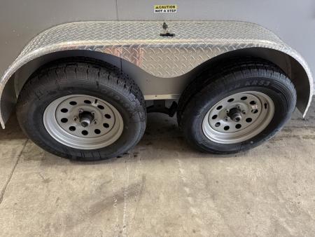 Used 2025 Cynergy Cargo 7X12 Silver Enclosed Cargo Trailer Tandem Axle with 7000 Capacity Cargo / Enclosed Trailer