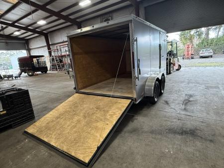 Used 2025 Cynergy Cargo 7X12 Silver Enclosed Cargo Trailer Tandem Axle with 7000 Capacity Cargo / Enclosed Trailer