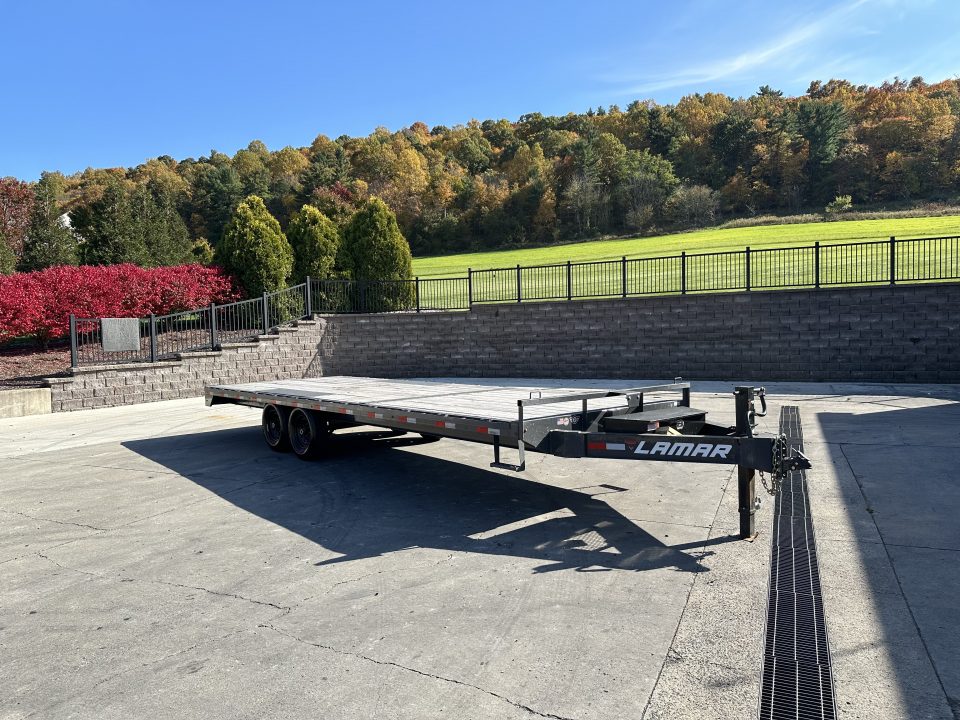 Used 2022 Lamar 22' Deck Over Equipment trailer with Slide in Ramps