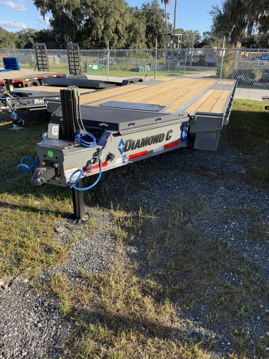 New 2027 Diamond C DET210 Equipment Trailer; 24X102; HYDRO JACK/TILT; 12K POP UP WINCH