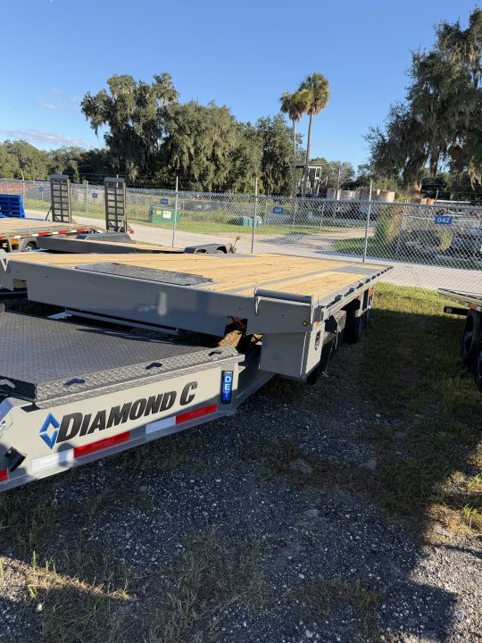 New 2027 Diamond C DET210 Equipment Trailer; 24X102; HYDRO JACK/TILT; 12K POP UP WINCH