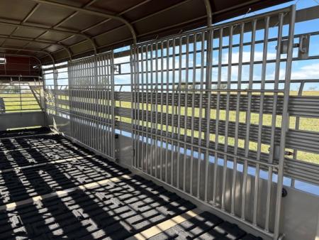 New 2026 Neckover 6'8x24x6'6 Tandem 14K GN Livestock Trailer W/ Tarp Top, Butterfly Gates, & Rubber Floor