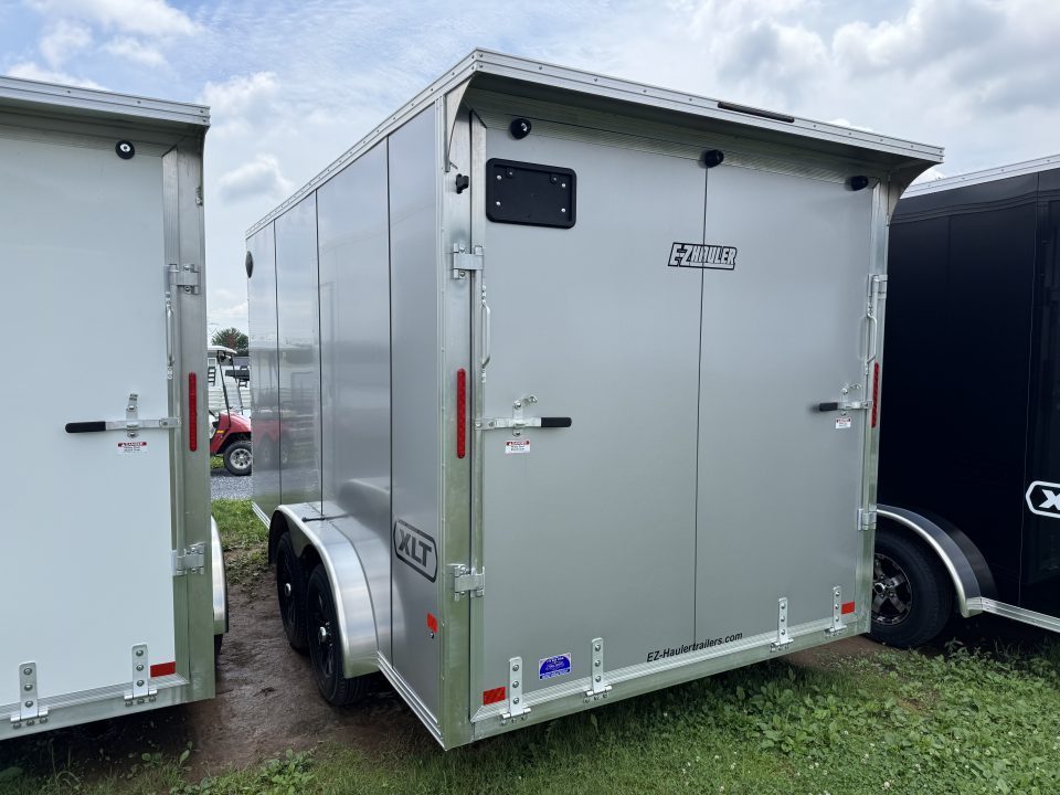 New 2027 E-Z Hauler EZEC7.5X14 XLT-P Cargo / Enclosed Trailer 71 SERIES 7 FOOT 1 INCH INTERIOR HEIGHT .080 POLY SIDES, TRANSLUCENT ROOF, REAR CANOPY, TORSION AXLES, FREE ALUMINUM WHEEL UPGRADE