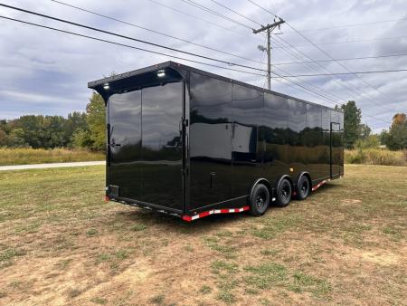 New 2027 8.5x28 Car Hauler 7'6" Interior - 5200lb Triple Spread Torsion - Black poly-blackout- Enclosed Car Hauler