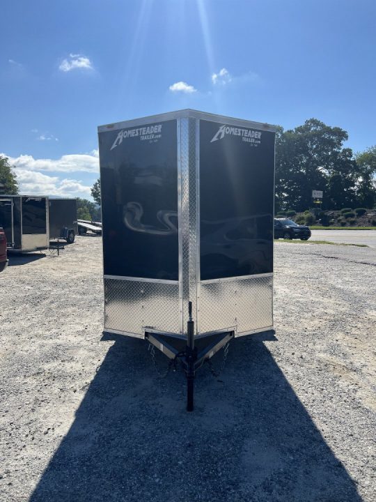 New 2027 Homesteader Trailer / 610IS Cargo / Enclosed Trailer / 6'6" Interior Height / Black in color / Side Door and Ramp Rear Door