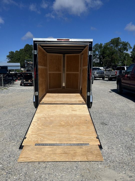 New 2027 Homesteader Trailer / 610IS Cargo / Enclosed Trailer / 6'6" Interior Height / Black in color / Side Door and Ramp Rear Door