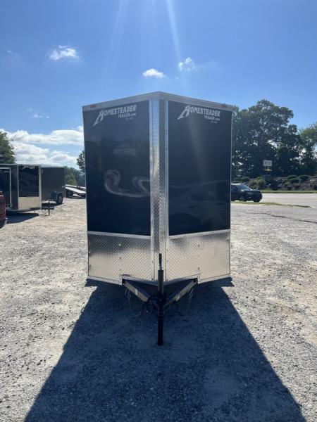New 2027 Homesteader Trailer / 610IS Cargo / Enclosed Trailer / 6'6" Interior Height / Black in color / Side Door and Ramp Rear Door