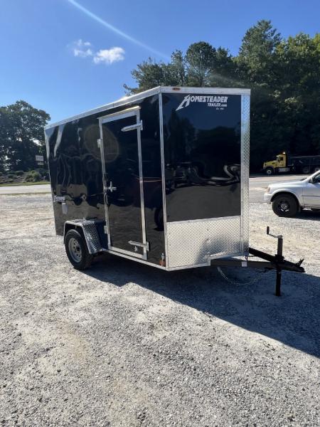 New 2027 Homesteader Trailer / 610IS Cargo / Enclosed Trailer / 6'6  Interior Height / Black in color / Side Door and Ramp Rear Door