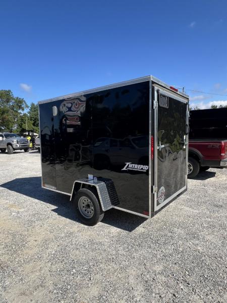 New 2027 Homesteader Trailer / 610IS Cargo / Enclosed Trailer / 6'6" Interior Height / Black in color / Side Door and Ramp Rear Door