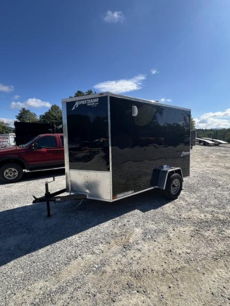 New 2027 Homesteader Trailer / 610IS Cargo / Enclosed Trailer / 6'6" Interior Height / Black in color / Side Door and Ramp Rear Door