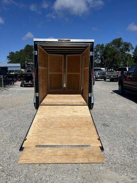 New 2027 Homesteader Trailer / 610IS Cargo / Enclosed Trailer / 6'6" Interior Height / Black in color / Side Door and Ramp Rear Door