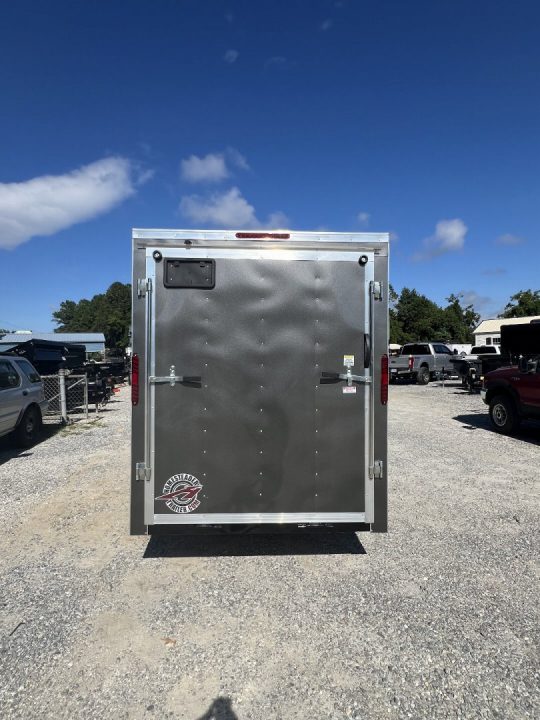 New 2027 Homesteader Trailer / 610IS Cargo / Enclosed Trailer / 6'6" Interior Height / Charcoal Gray in color / Side Door w/ RV Door Lock and Ramp Rear Door