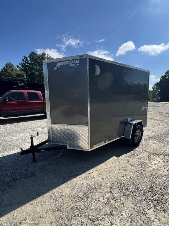New 2027 Homesteader Trailer / 610IS Cargo / Enclosed Trailer / 6'6" Interior Height / Charcoal Gray in color / Side Door w/ RV Door Lock and Ramp Rear Door