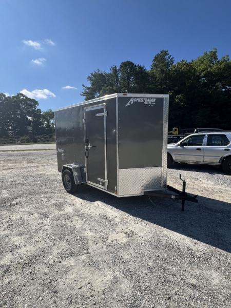 New 2027 Homesteader Trailer / 610IS Cargo / Enclosed Trailer / 6'6" Interior Height / Charcoal Gray in color / Side Door w/ RV Door Lock and Ramp Rear Door