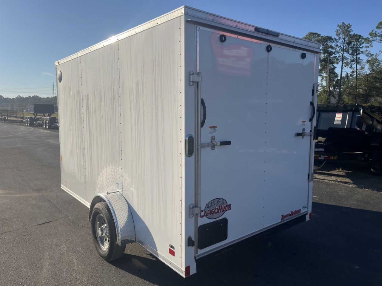 New GANS712SA CARGO MATE 7' X 12' ENCLOSED CARGO TRAILER W/ REAR RAMP DOOR, SIDE DOOR, & UPGRADES