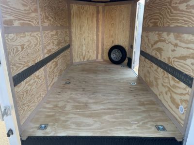 New GANS712SA CARGO MATE 7' X 12' ENCLOSED CARGO TRAILER W/ REAR RAMP DOOR, SIDE DOOR, & UPGRADES
