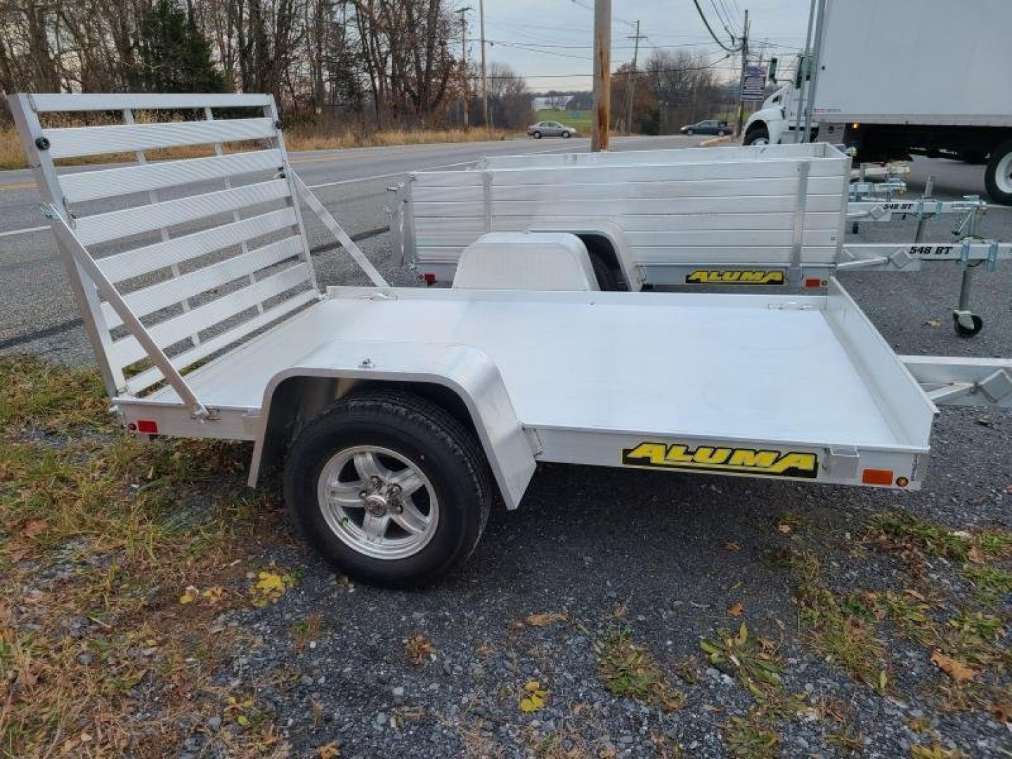 New 2027 Aluma 638S-TG One Piece Gate Utility Trailer ONE FOOT SOLID SIDES, ALUMINUM WHEELS, FALL CLEARANCE IN STOCK ONLY