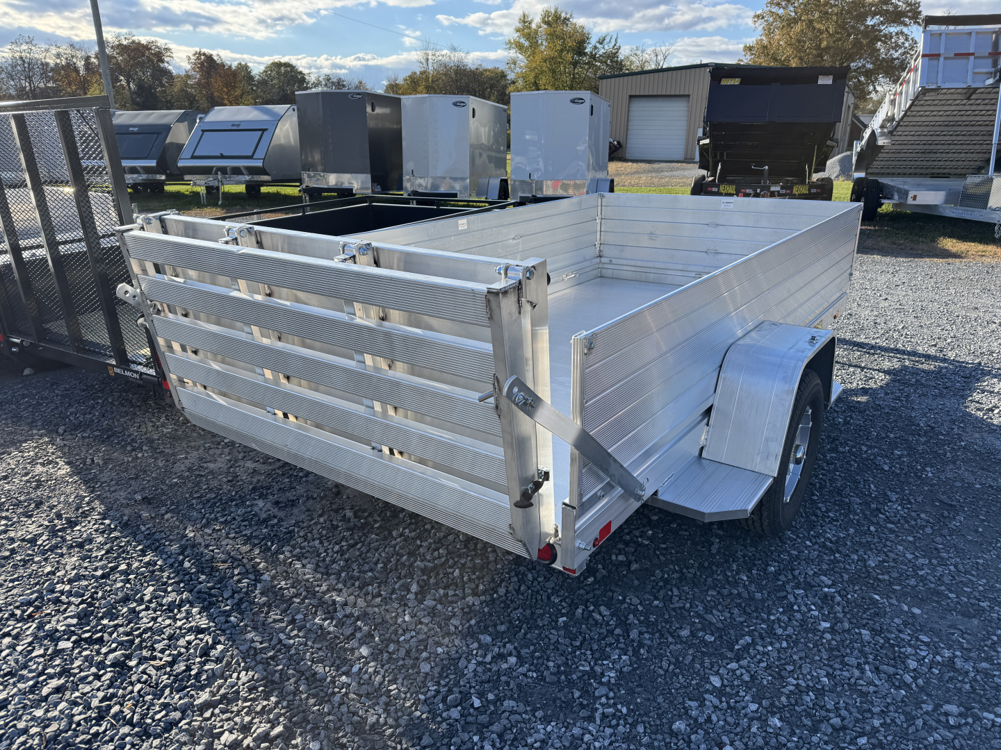 New 2026 Aluma 6310S-BT 2ft Solid Sides Bifold Gate Utility Trailer FALL CLEARANCE IN STOCK ONLY