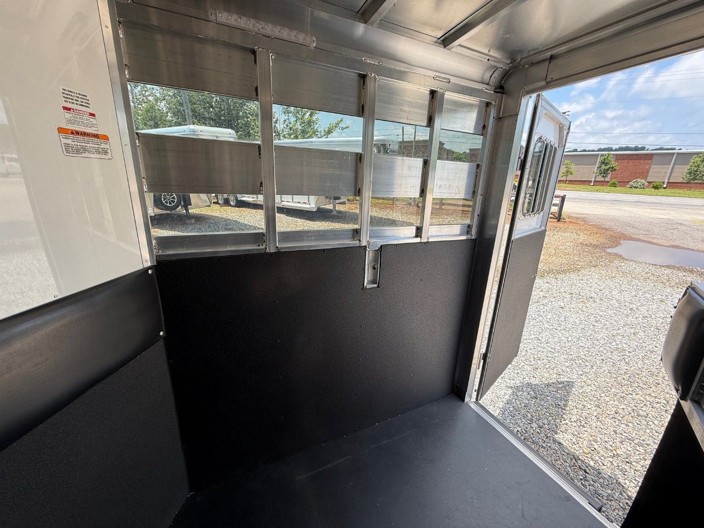 Used 2024 Sundowner Super Sport 2 Horse Slant Bumper Pull