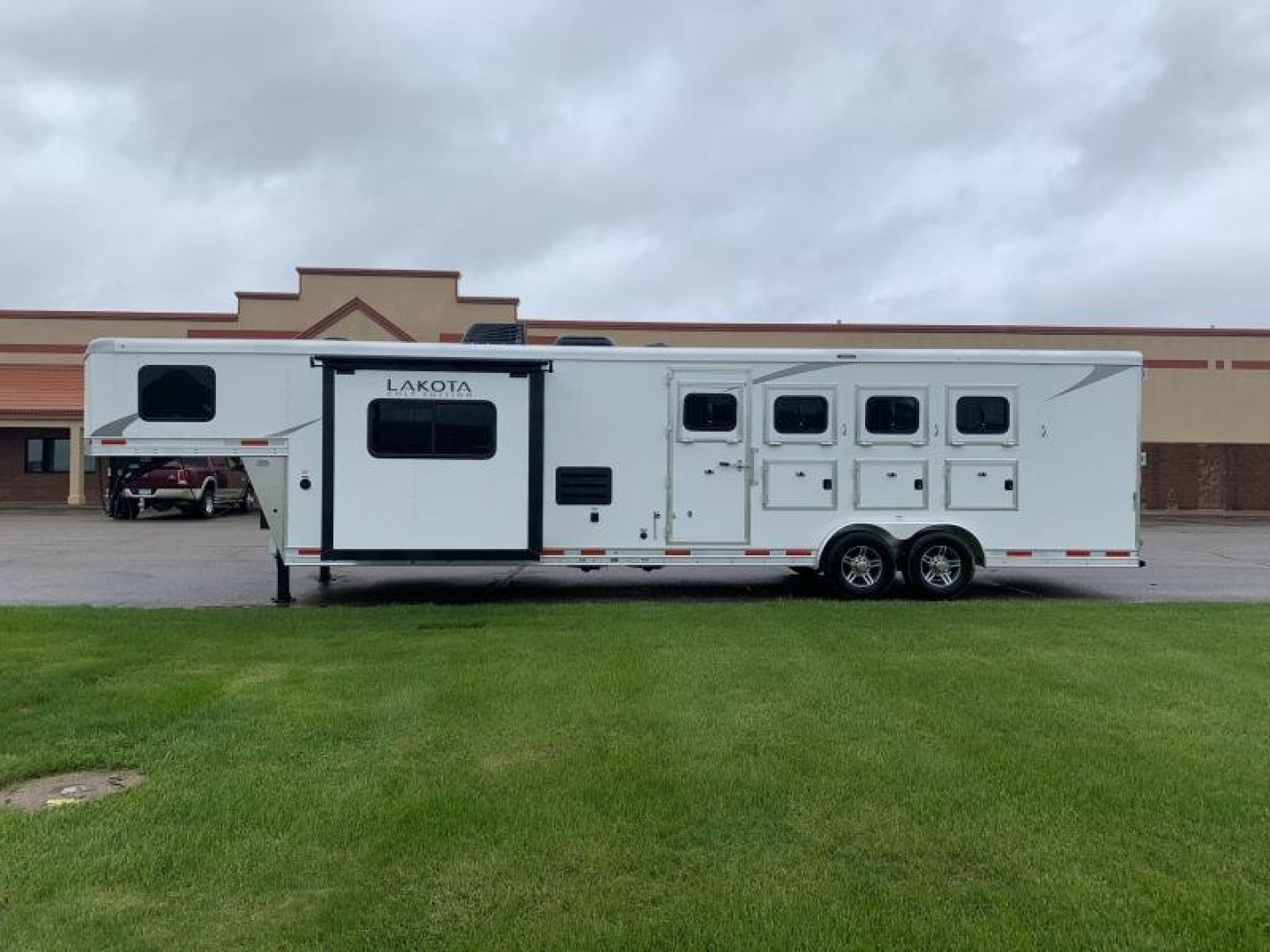 New 2023 Lakota 4 Horse 13' LQ Colt Horse Trailer