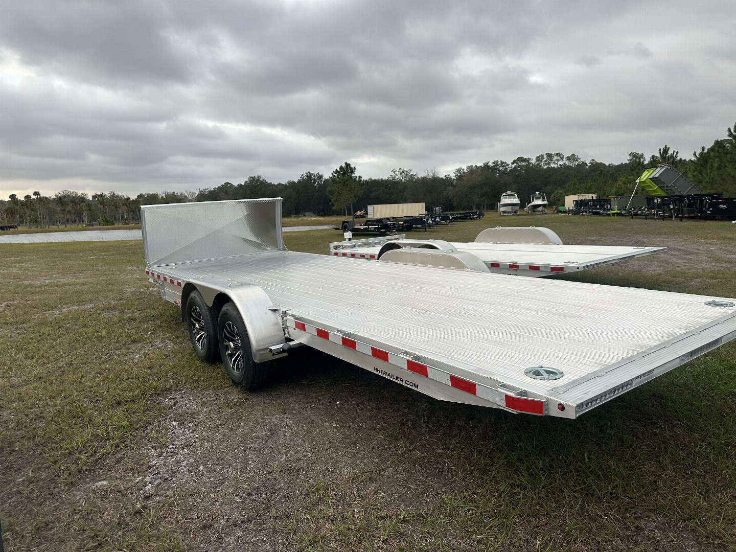 New 2025 H&H Trailers 10K 82X22 Car Hauler Aluminum Electric Tilt Speed Loader