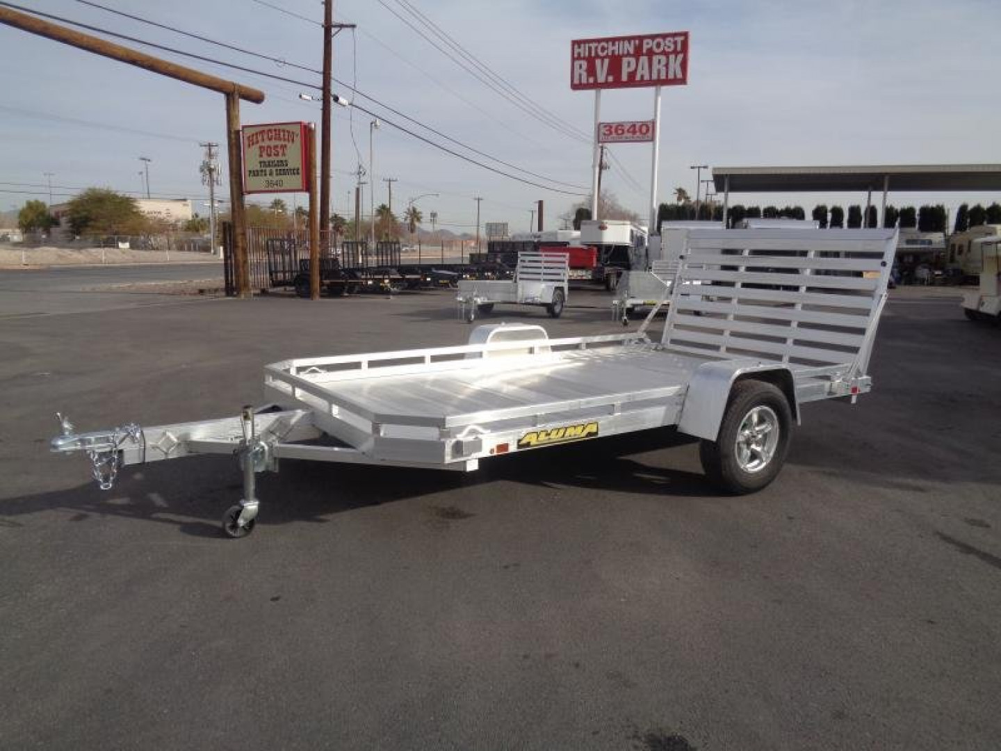 New 2023 Aluma 7712H Utility Trailer