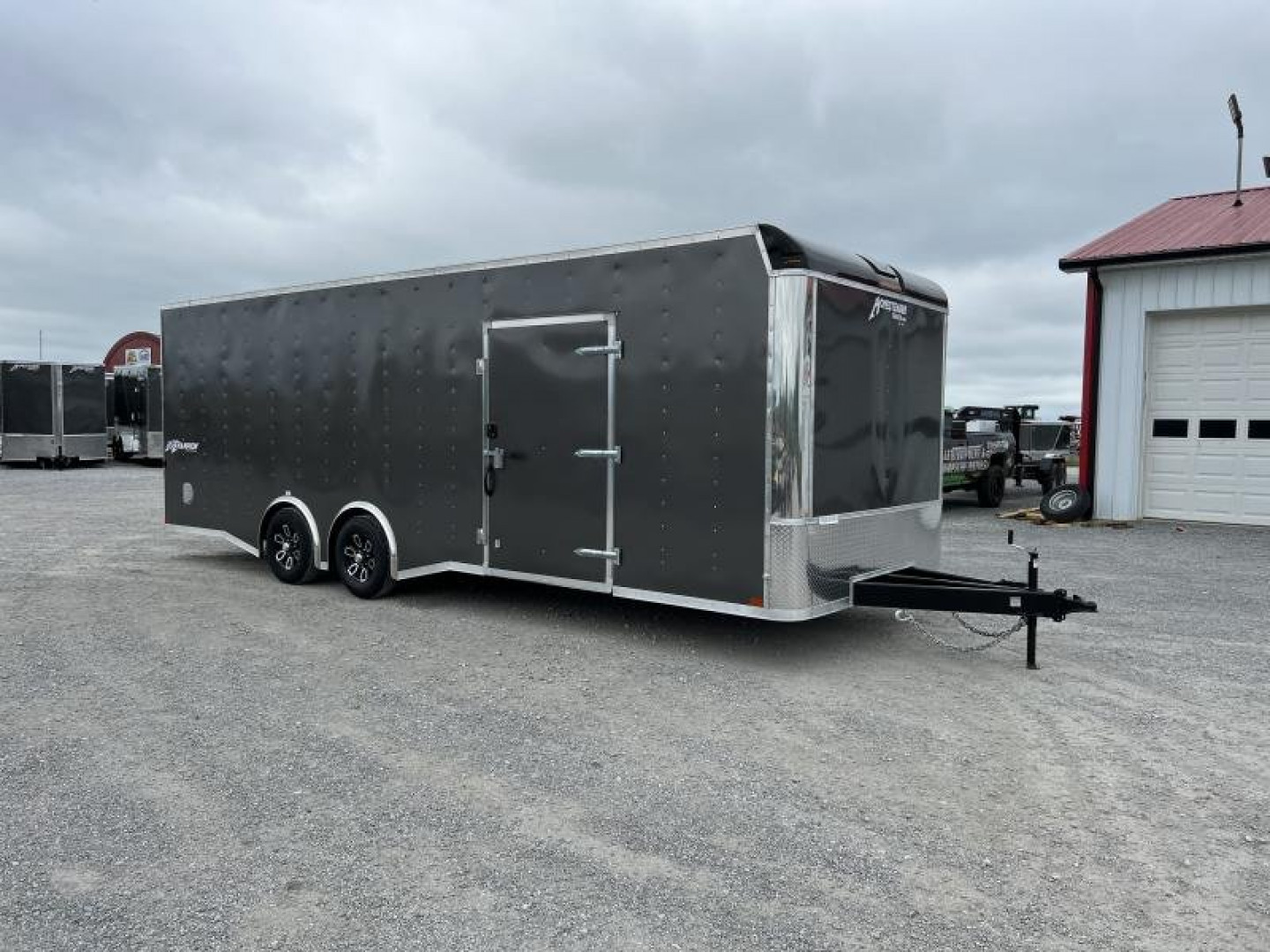 New 2025 Homesteader 8.5'x24' Champion Spread Axle Enclosed Race Trailer