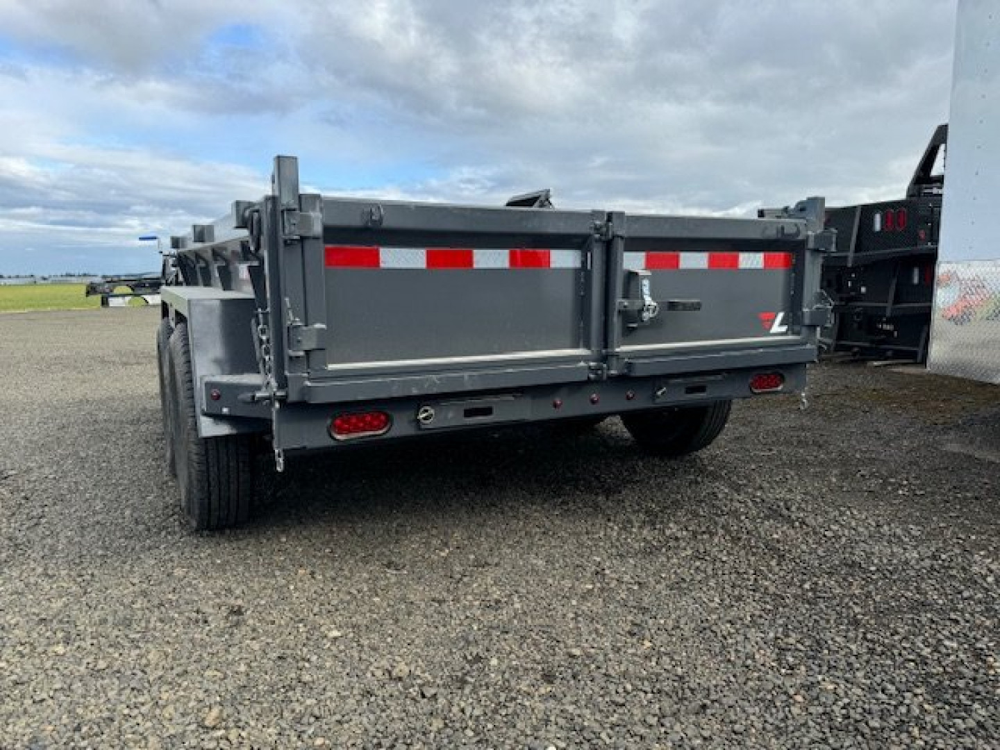 New 2025 Lamar Trailers DM 77"x 10'/10K DUMP Dump Trailer 18" SIDES