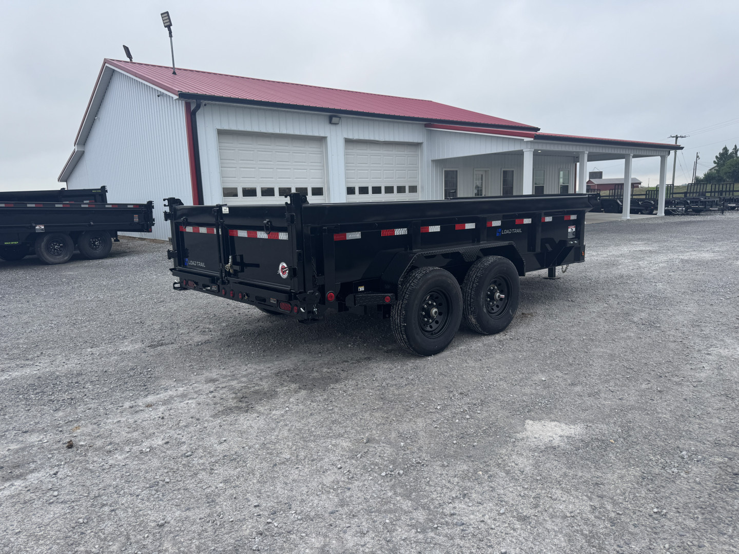 New 2026 Load Trail 83"x14' Scissor Lift Dump Trailer