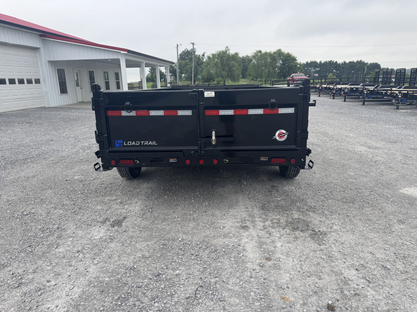 New 2026 Load Trail 83"x14' Scissor Lift Dump Trailer