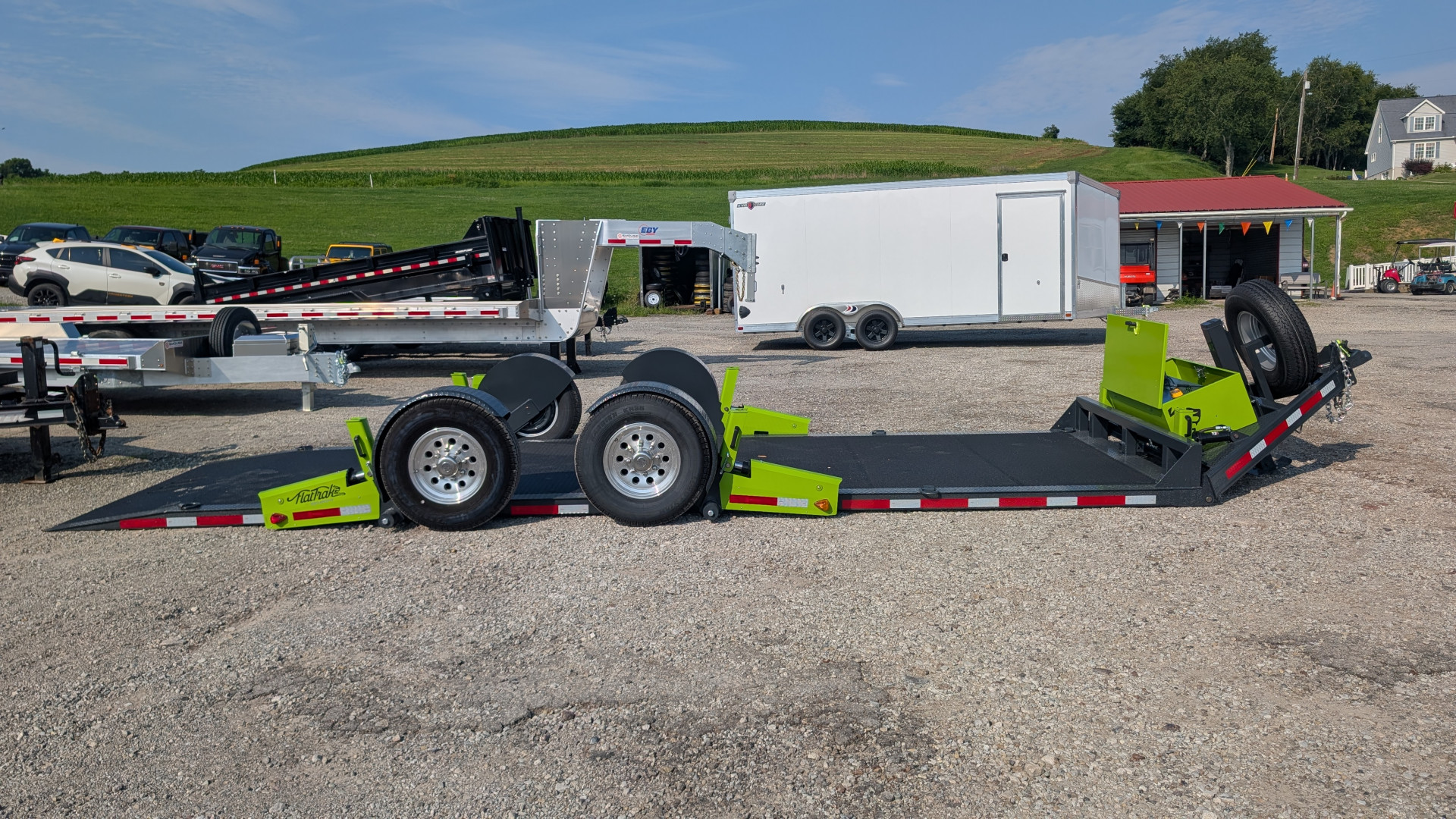 New 2025 FlatTrak by Belmont 7x22 HD Lay Flat Tilt Equipment Hauler