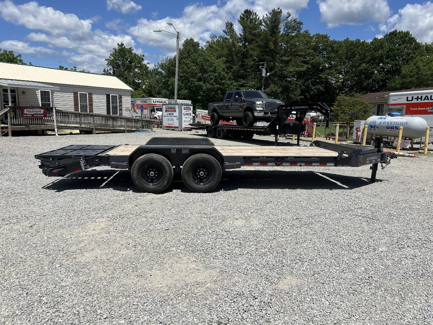 New 2026 Iron Bull EWB Series Equipment Trailer / 83"x22 / 2-7,000# Electric Brake Axles / Rampage Ramps / Jumbo Toolbox