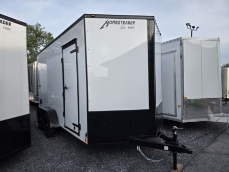 New 7 x 14 Homesteader Intrepid V-Nose Cargo 7k GVWR **White w/ BlackOut Pkg, 6" Extra Height & Ramp Door Package, Rear Spoiler w/ Lights