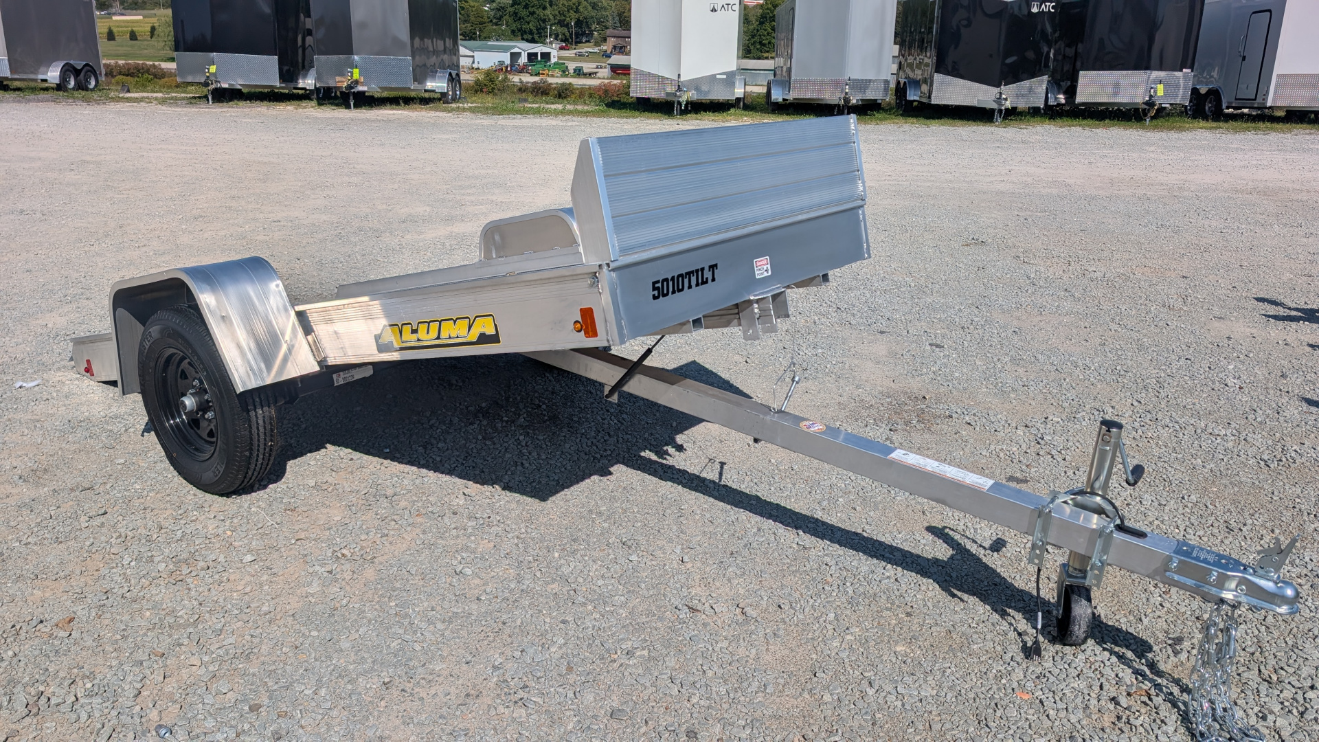 New 2026 Aluma 4'2" x 10 Tilt & GO Adventure Trailer (Snowmobiles, ATVs, Golf Carts!!!)