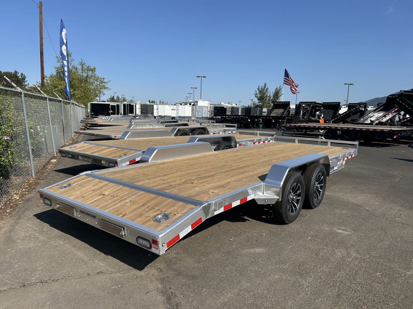New 2025 Sure-Trac 7x20 (18+2) Aluminum Frame Wood Deck Car Hauler 7K GVWR
