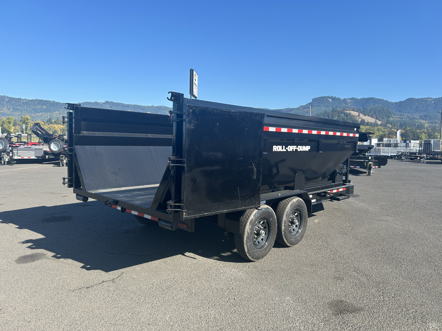 New 2025 Sure-Trac 7X16 -ROLLOFF DUMP CARRIER- BUMPER PULL- 15.4K GVWR
