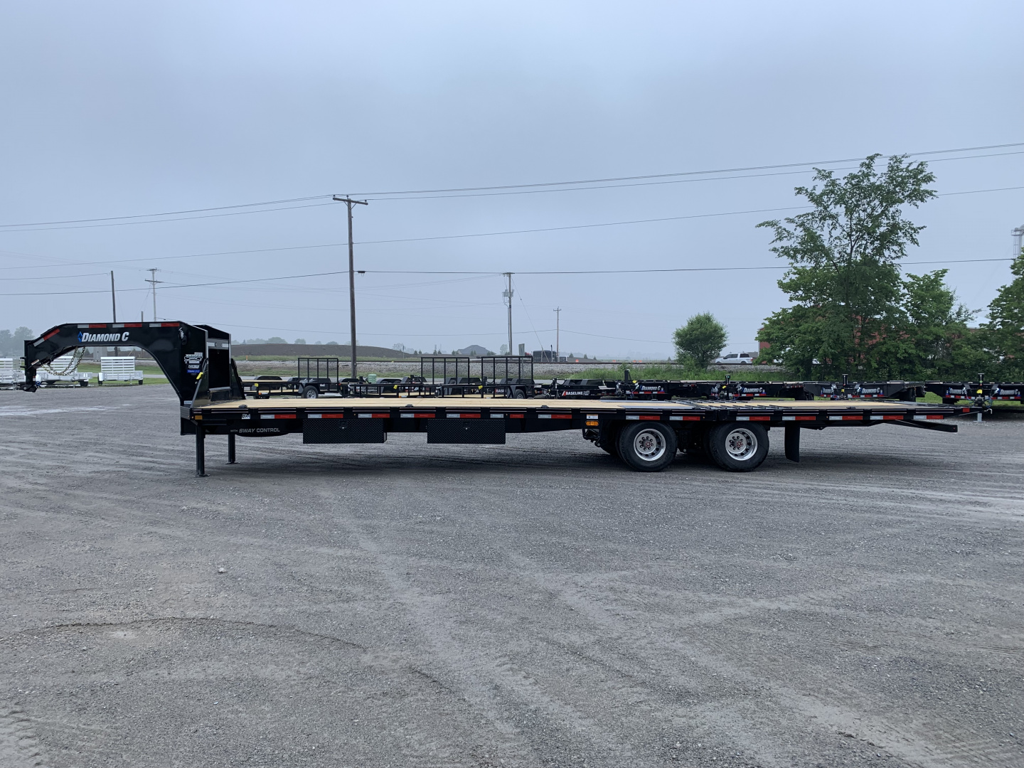 New 2026 Diamond C Trailers FMAX212L32X102HDT (32' X 102") 25.9K (Pacesetter Ed.) Hydraulic Dovetail Flatbed Trailer