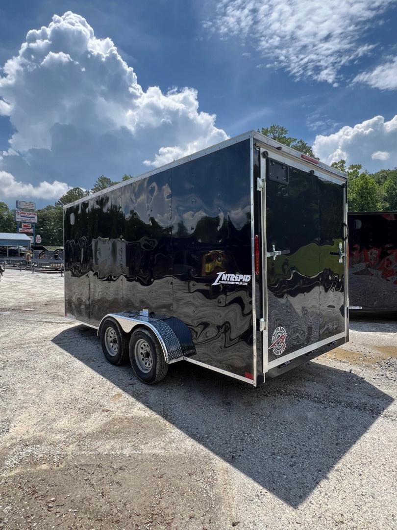 New 2026 HOMESTEADER CARGO TRAILER / INTREPID SERIES / 7'X16' / 7' INTERIOR HEIGHT / 32" SIDE DOOR W/ RV LOCK / RAMPS REAR DOOR / .030 BLACK ALUMINUM